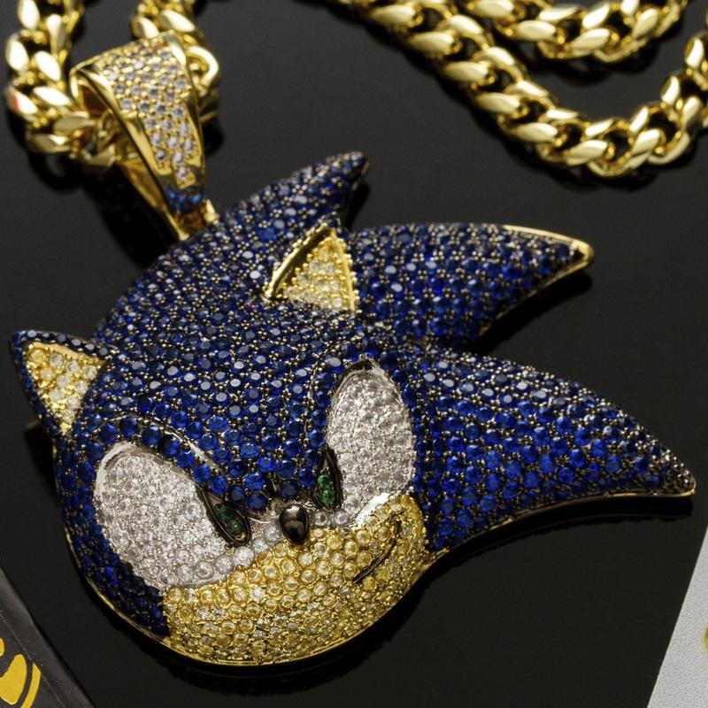 closeup of Sonic The Hedgehog necklace on black background